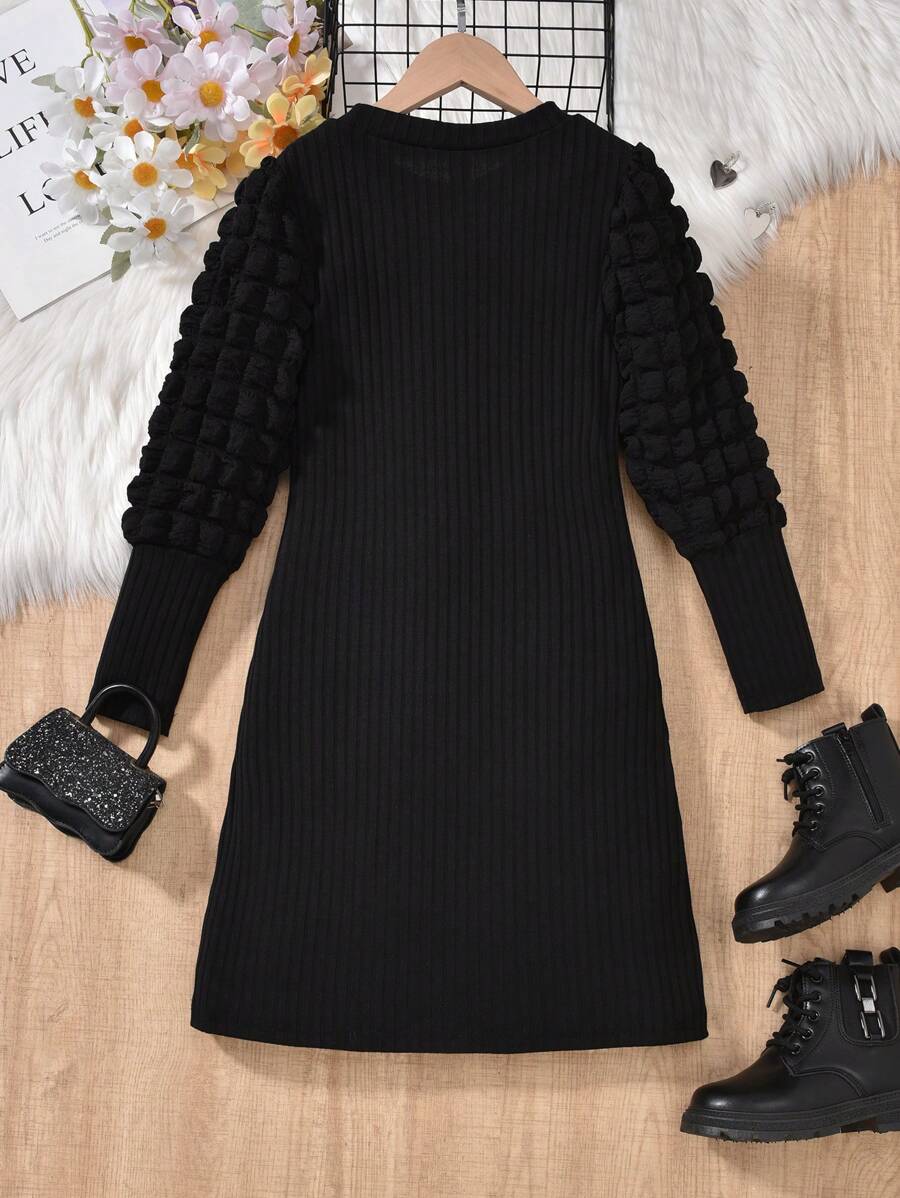 Vestido negro elegante con mangas abullonadas - Imagen 2